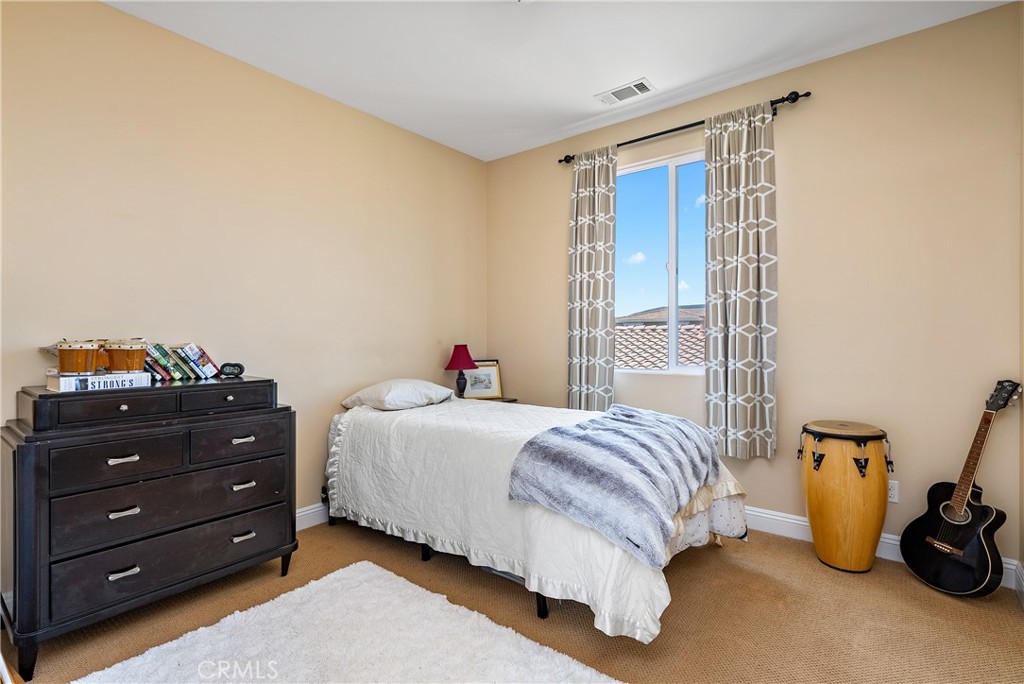 419 Junipero Way San Luis Obispo, CA 93401 - Photo 12 of 29 a bedroom with a bed and a window