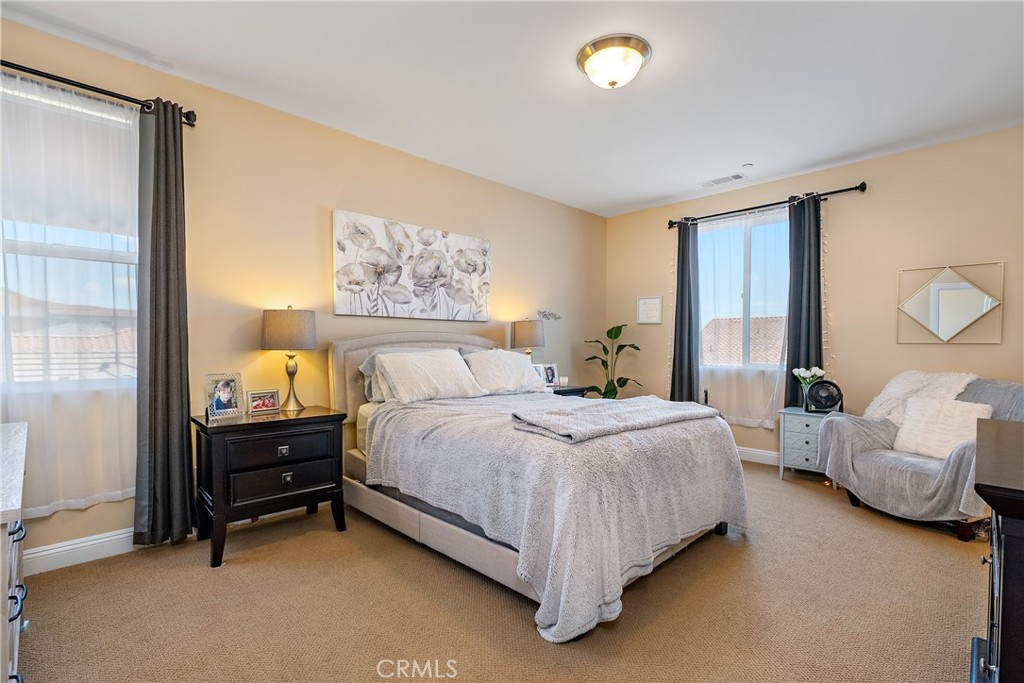 419 Junipero Way San Luis Obispo, CA 93401 - Photo 13 of 29 a spacious bedroom with a bed and window