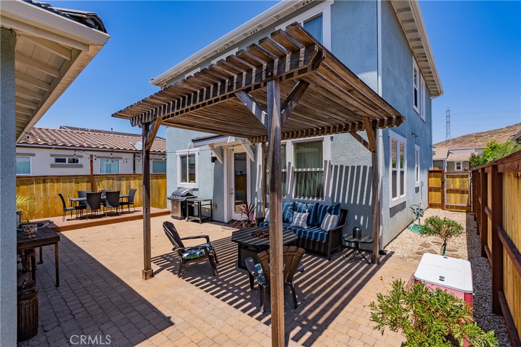 419 Junipero Way San Luis Obispo, CA 93401 - Photo 22 of 29 a view of a patio with a table and chairs