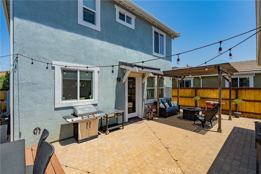 419 Junipero Way San Luis Obispo, CA 93401 - Photo 23 of 29 a view of a patio with a table and chairs