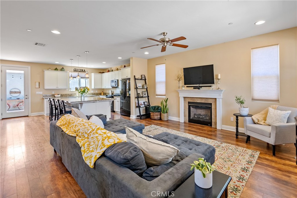 419 Junipero Way San Luis Obispo, CA 93401 - Photo 4 of 29 a living room with fireplace furniture and a flat screen tv