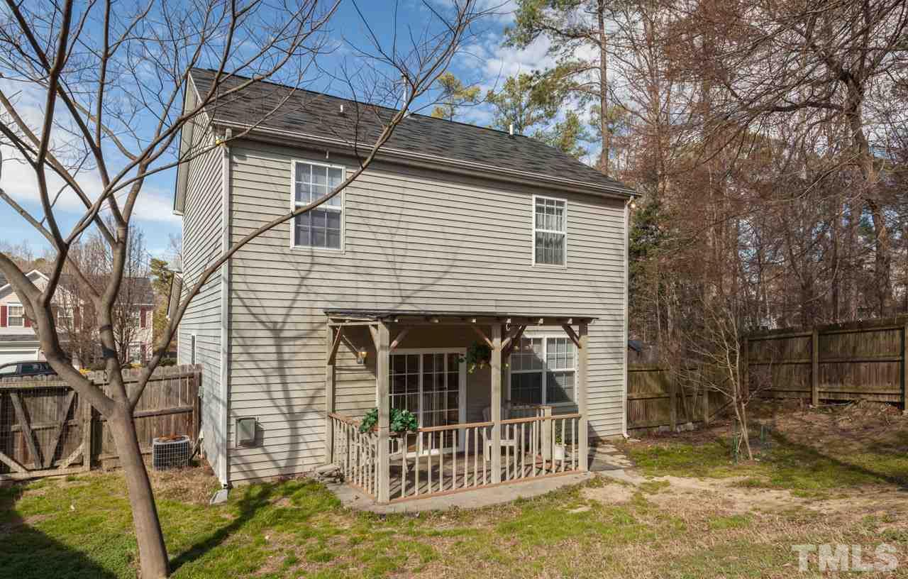 4004 Iverson Street Raleigh, NC 27604 - Photo 22 of 24 a view of house with a yard and large tree