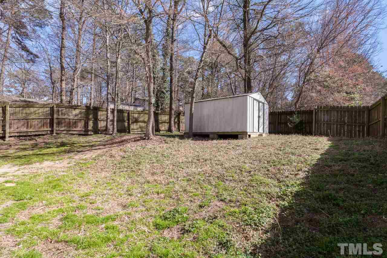 4004 Iverson Street Raleigh, NC 27604 - Photo 23 of 24 a view of a backyard with large trees