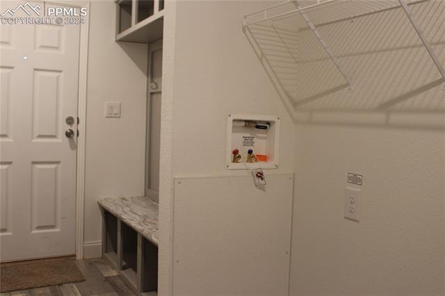 40391 Gieck Road Rush, CO 80833 - Photo 8 of 17 Laundry area with cabinetry in foyer