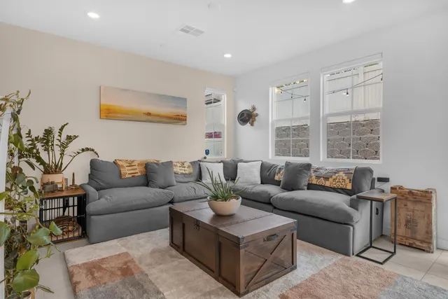 a kitchen with refrigerator cabinets and a sink