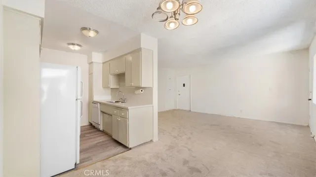 a hallway with cabinets