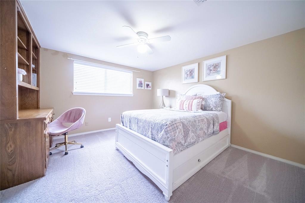 919 Green Hills Road Duncanville, TX 75137 - Photo 24 of 37 Bedroom with carpet, baseboards, and ceiling fan