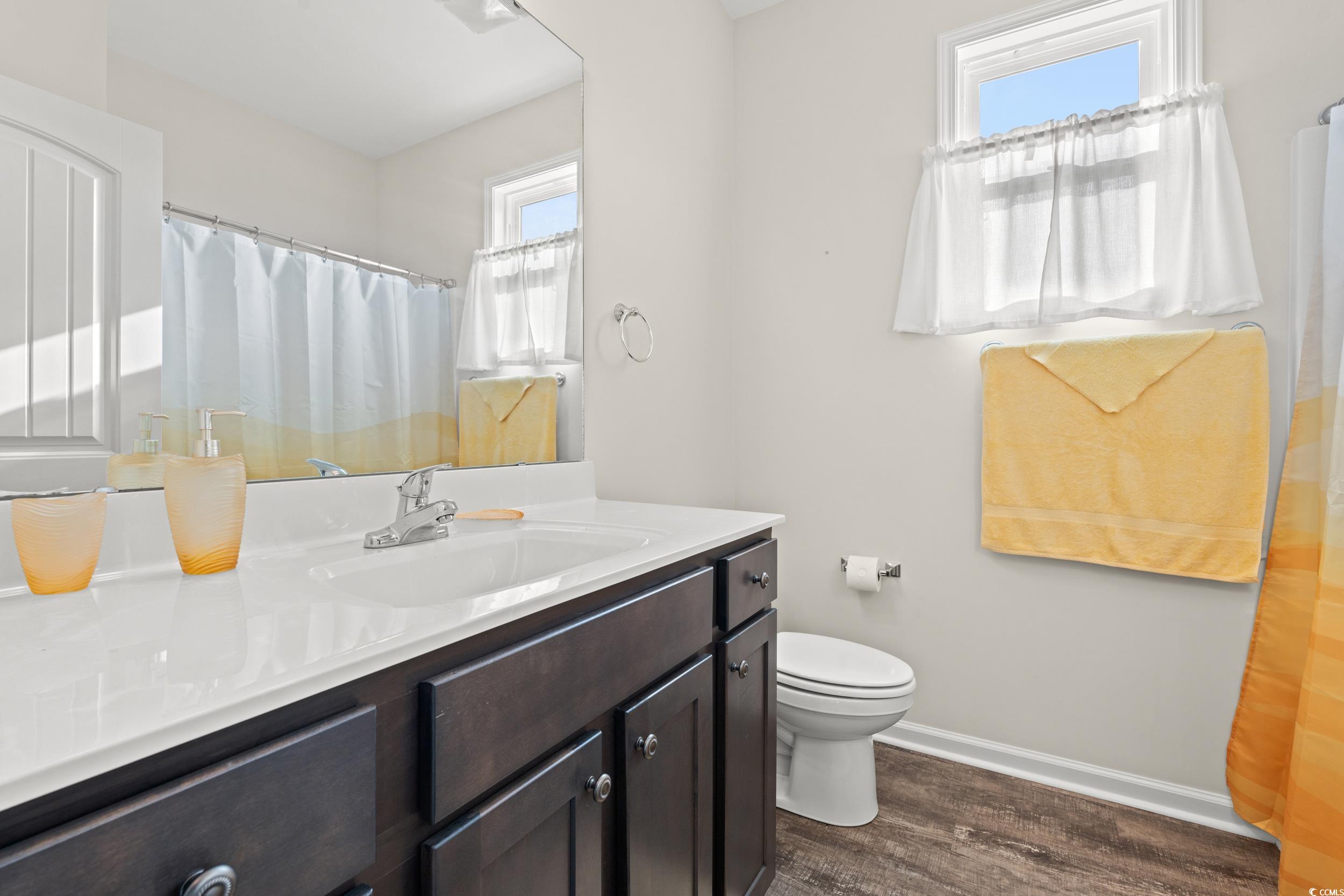 327 Fox Bay Road Loris, SC 29569 - Photo 14 of 23 Full bathroom featuring LPV floors, and a shower with curtain.