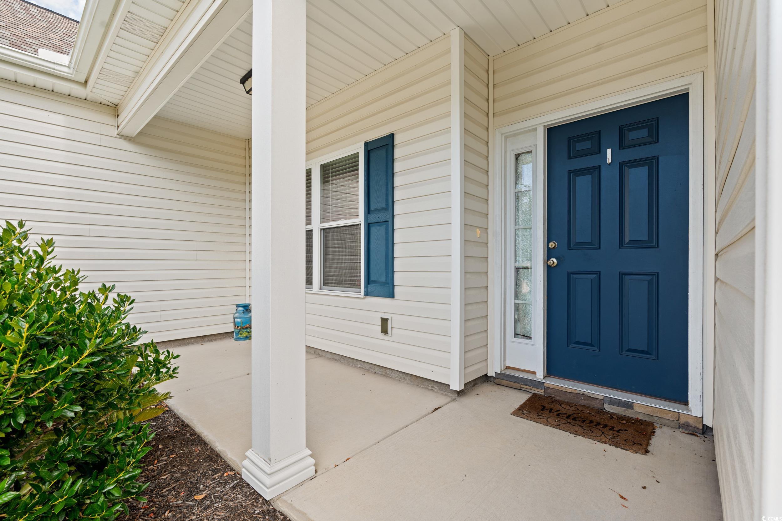 327 Fox Bay Road Loris, SC 29569 - Photo 17 of 23 Front door. View of exterior entry featuring a porch.