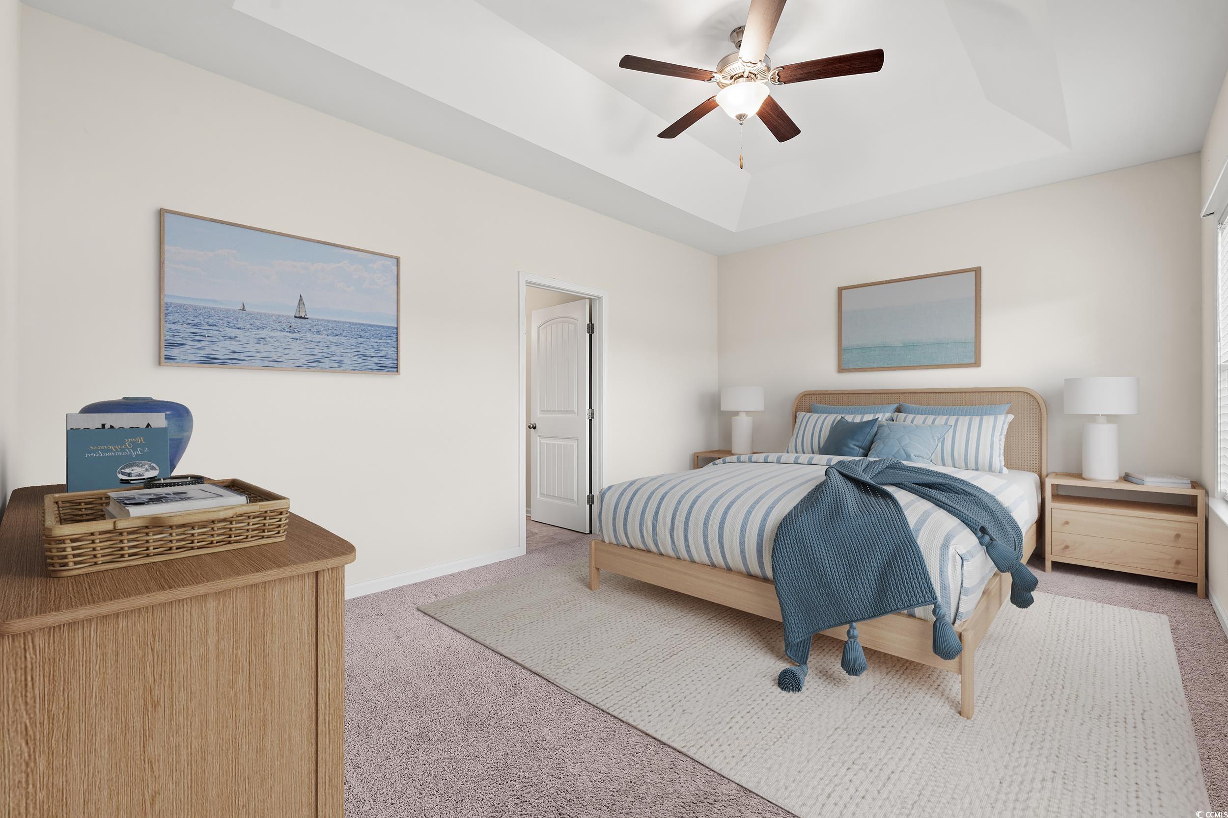 327 Fox Bay Road Loris, SC 29569 - Photo 9 of 23 Bedroom featuring a tray ceiling, light colored carpet, and ceiling fan. This photo represents a staged bedroom.