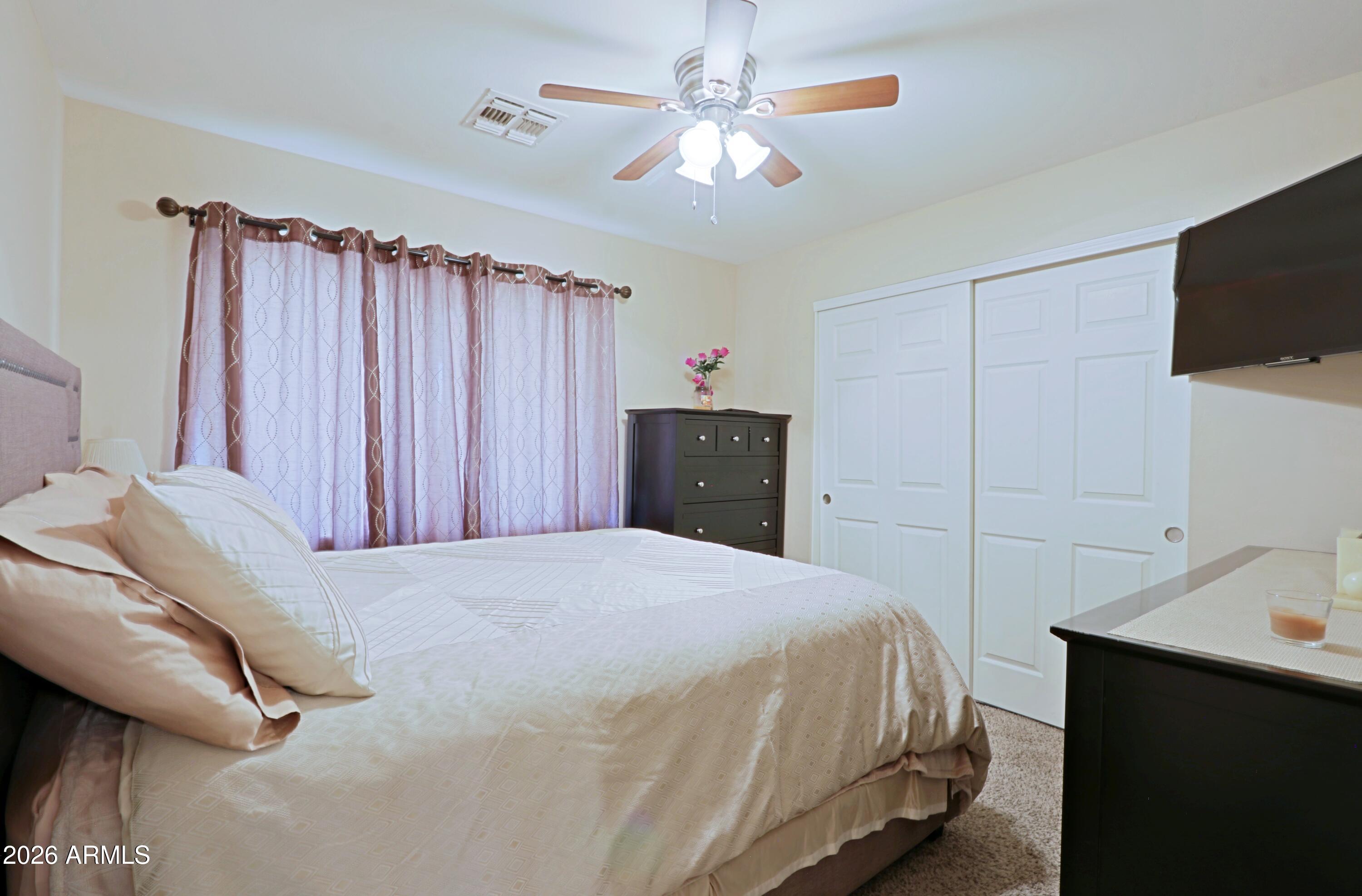 3721 West Calavar Road Phoenix, AZ 85053 - Photo 14 of 31 Guest bedroom 1