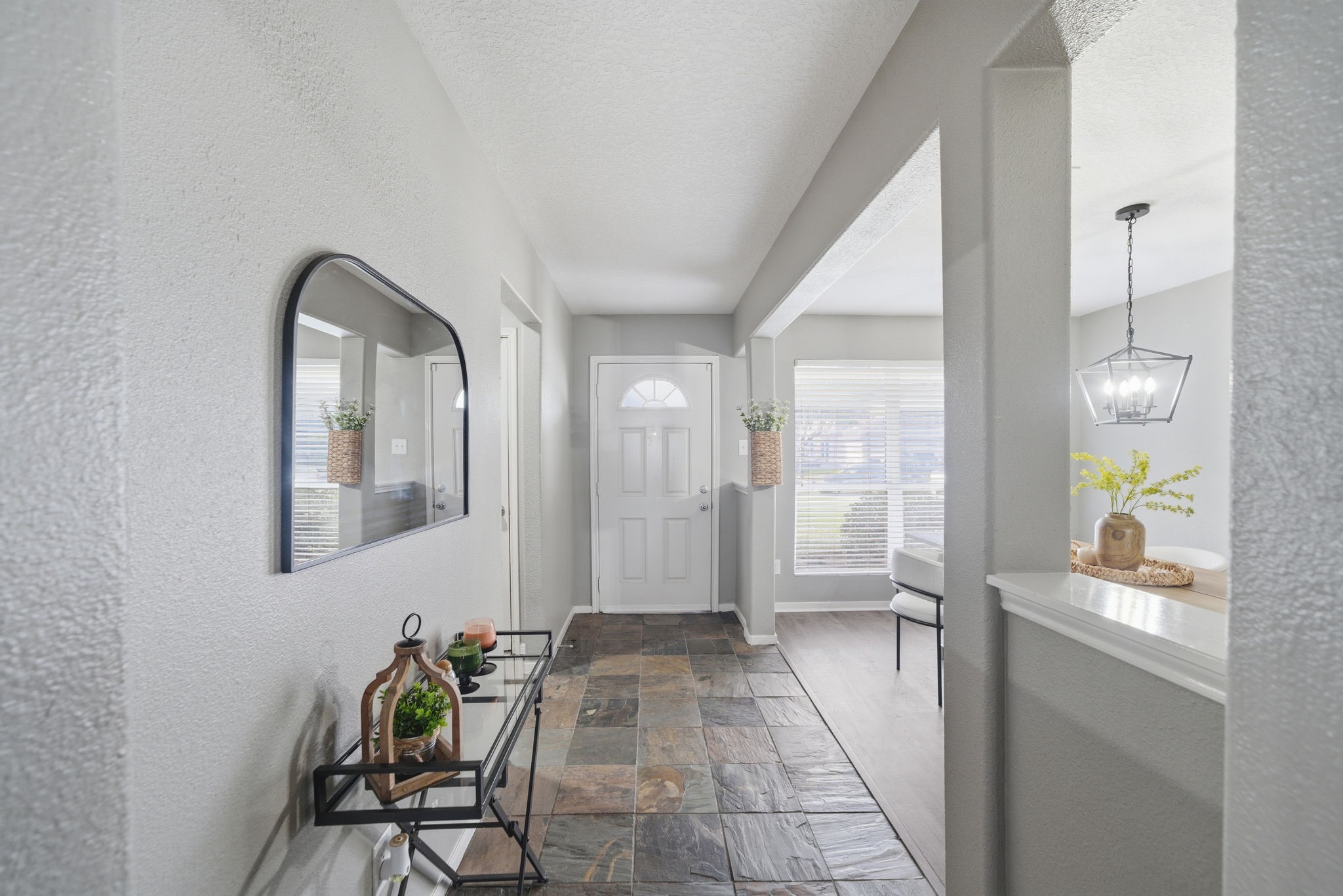 14422 Leafy Tree Drive Houston, TX 77090 - Photo 3 of 40 a view of a entryway door and dining room