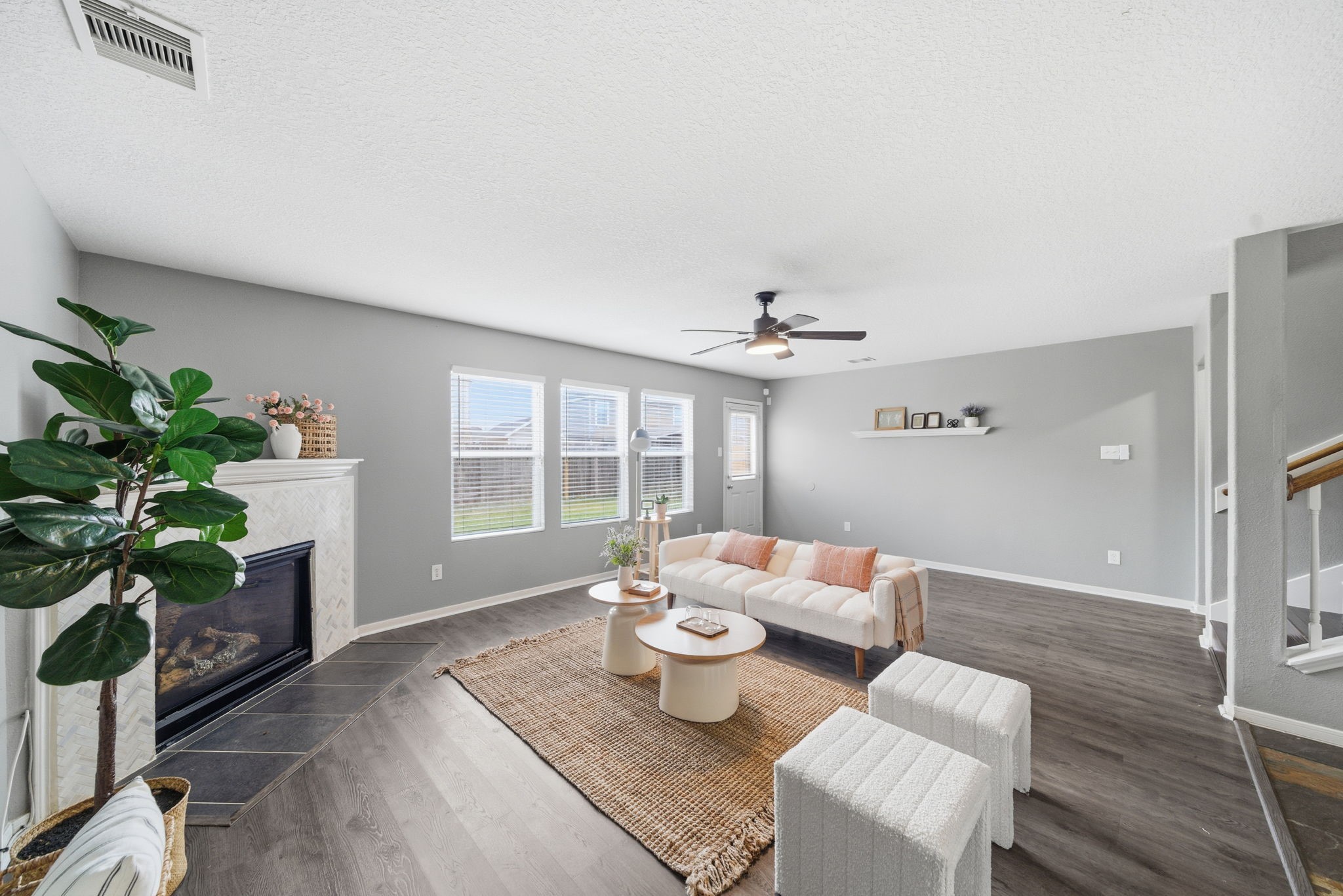 14422 Leafy Tree Drive Houston, TX 77090 - Photo 5 of 40 a living room with furniture and a potted plant