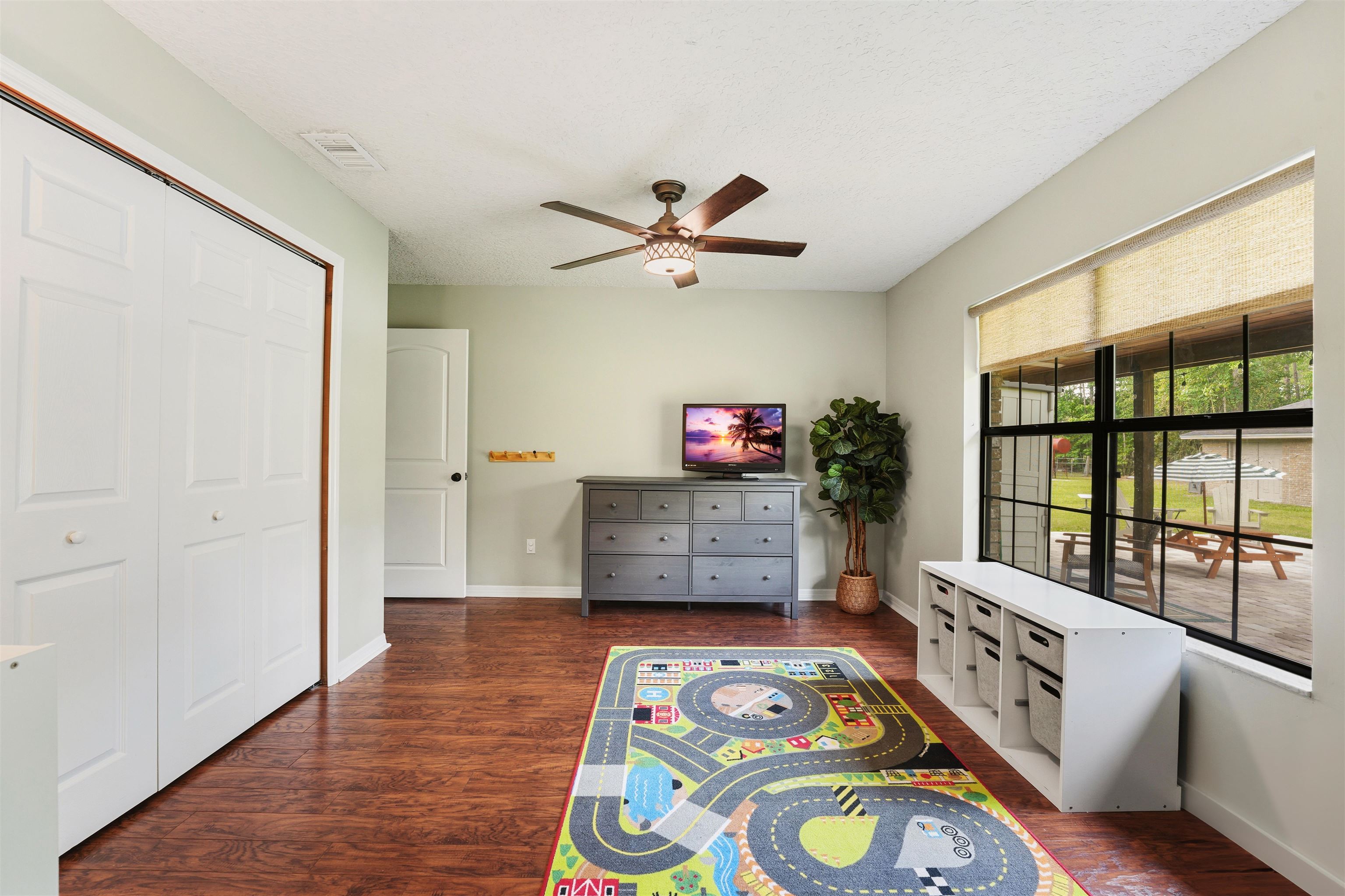 1805 Bennett Road St. Augustine, FL 32092 - Photo 29 of 65 a living room with furniture and a baby crib