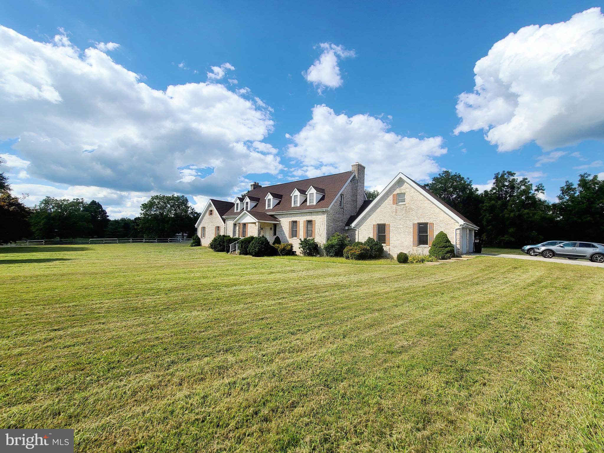 13212 Beaver Dam Road Cockeysville, MD 21030 - Photo 1 of 55 a front view of house with yard and green space