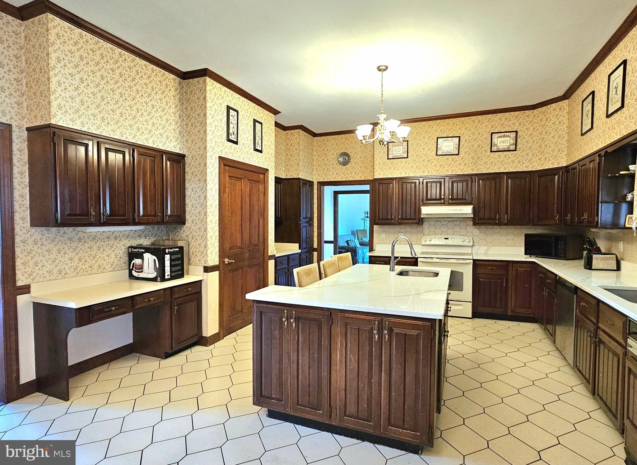 13212 Beaver Dam Road Cockeysville, MD 21030 - Photo 13 of 55 a kitchen with stainless steel appliances granite countertop a sink stove and refrigerator