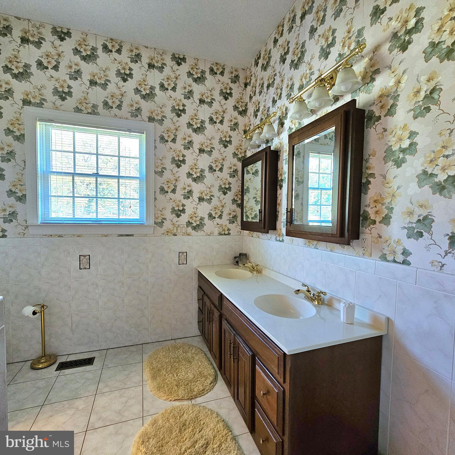 13212 Beaver Dam Road Cockeysville, MD 21030 - Photo 29 of 55 a bathroom with a sink and a mirror