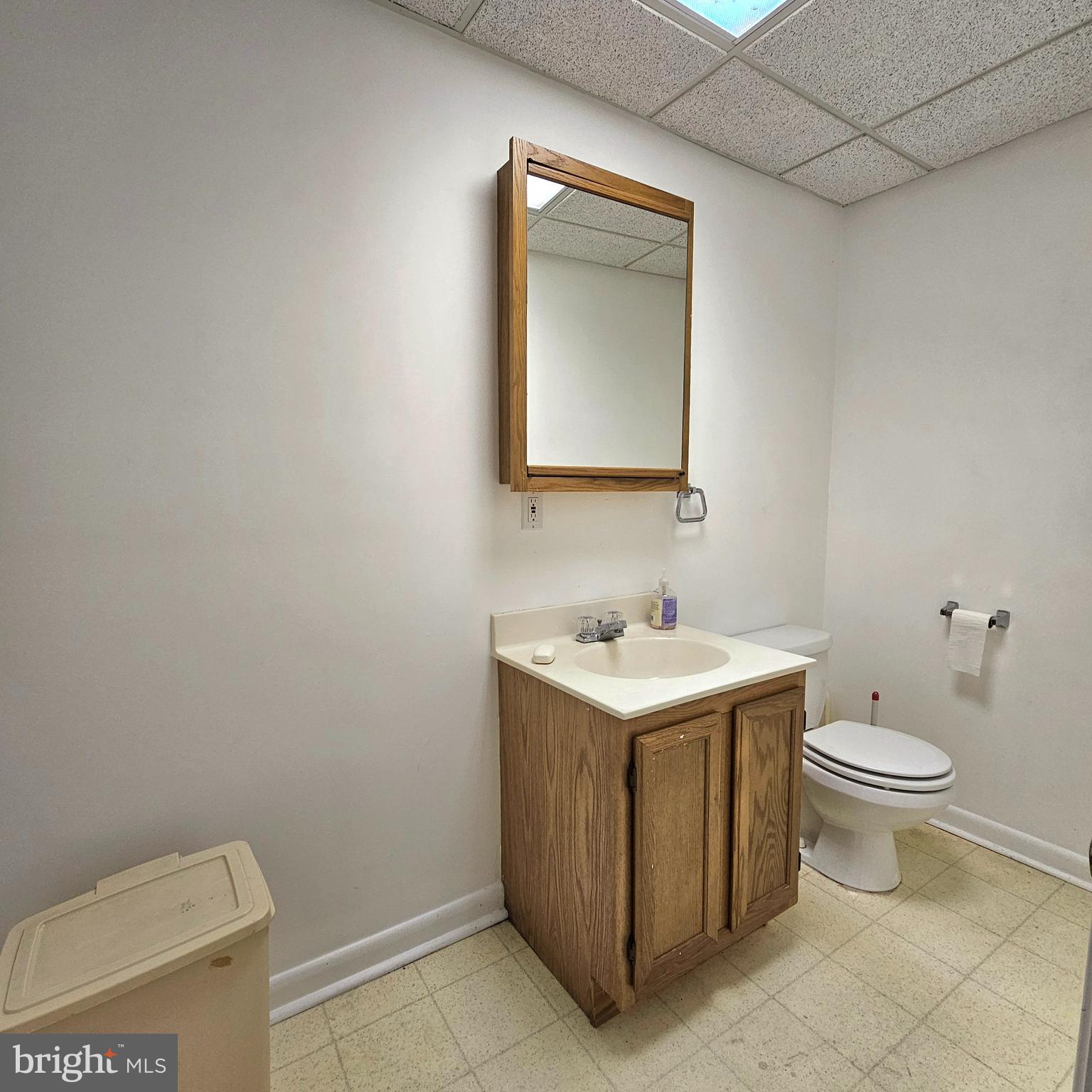 13212 Beaver Dam Road Cockeysville, MD 21030 - Photo 46 of 55 a bathroom with a toilet sink and mirror