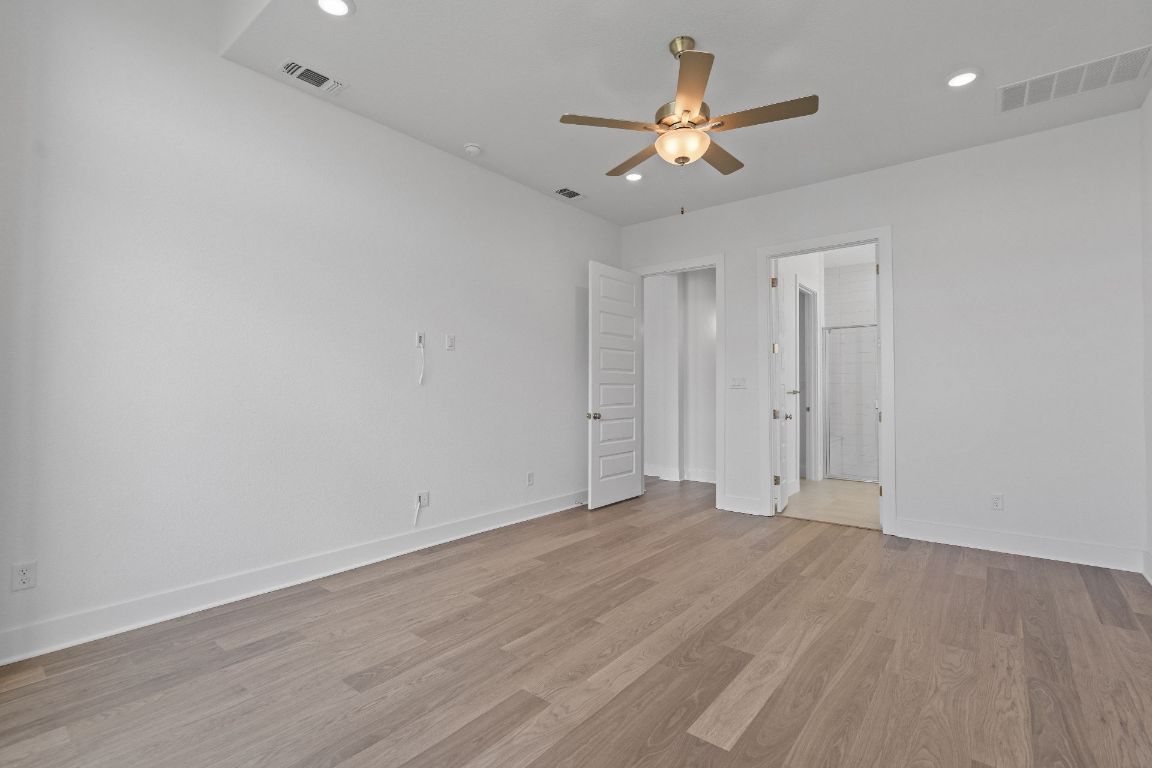 816 South Hemingway Loop Liberty Hill, TX 78642 - Photo 17 of 40 Primary Bedroom with elevated ceiling