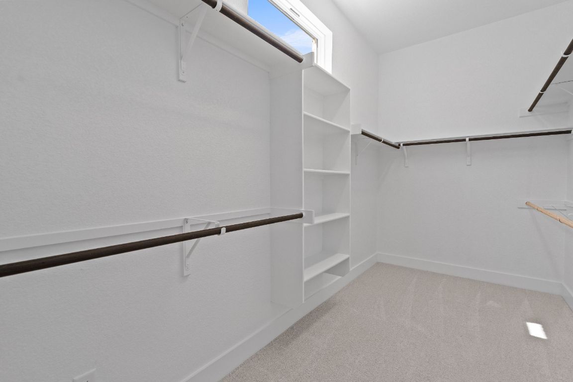 816 South Hemingway Loop Liberty Hill, TX 78642 - Photo 20 of 40 Walk-in closet in Primary Bedroom