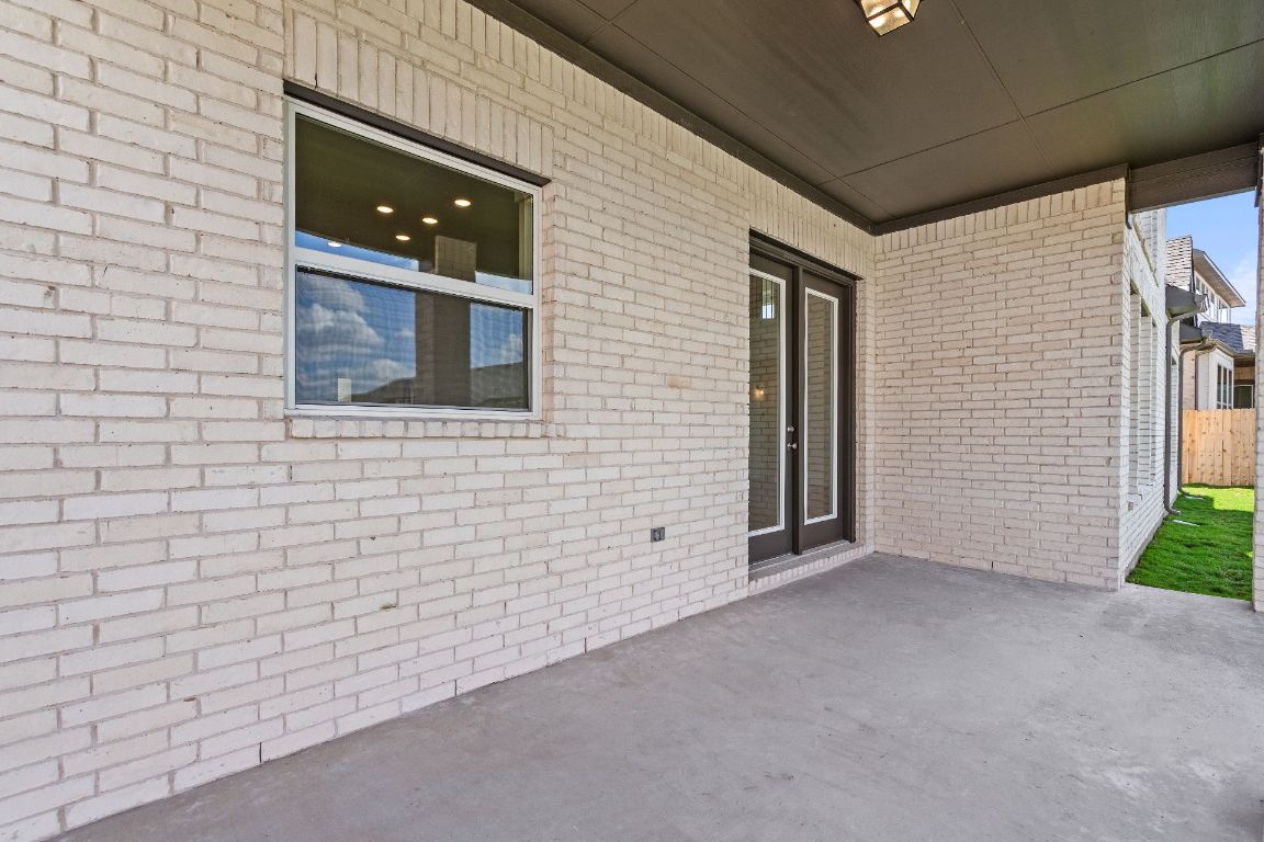 816 South Hemingway Loop Liberty Hill, TX 78642 - Photo 29 of 40 Rear Covered Patio