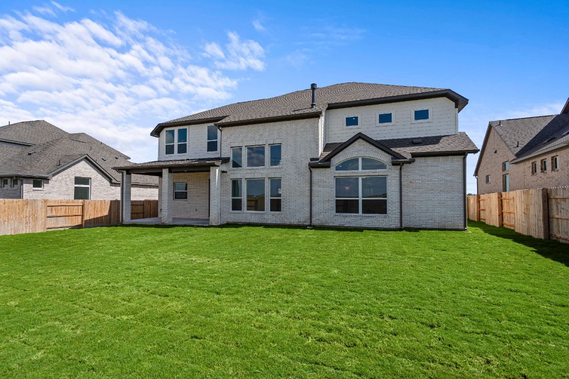 816 South Hemingway Loop Liberty Hill, TX 78642 - Photo 31 of 40 Rear of Home and Private Backyard