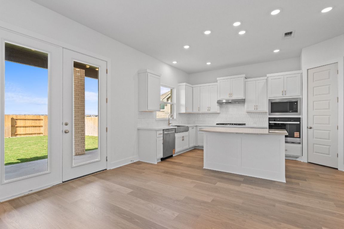 816 South Hemingway Loop Liberty Hill, TX 78642 - Photo 10 of 40 From Casual Dining to Kitchen