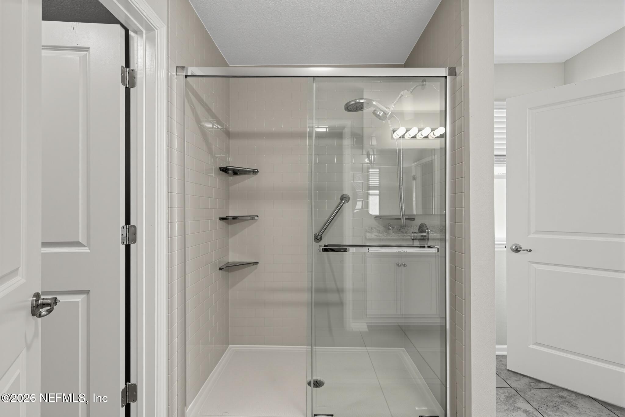 331 Meadow Ridge Drive St. Augustine, FL 32092 - Photo 24 of 36 28_331_Meadow_Ridge_Dr-Bathroom-7815