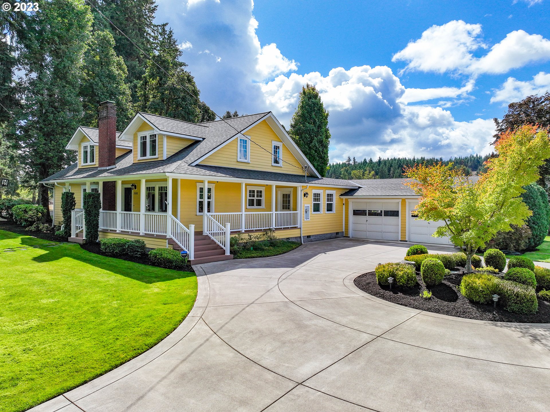 37692 Wheeler Road Dexter, OR 97431 - Photo 1 of 48 a front view of a house with garden