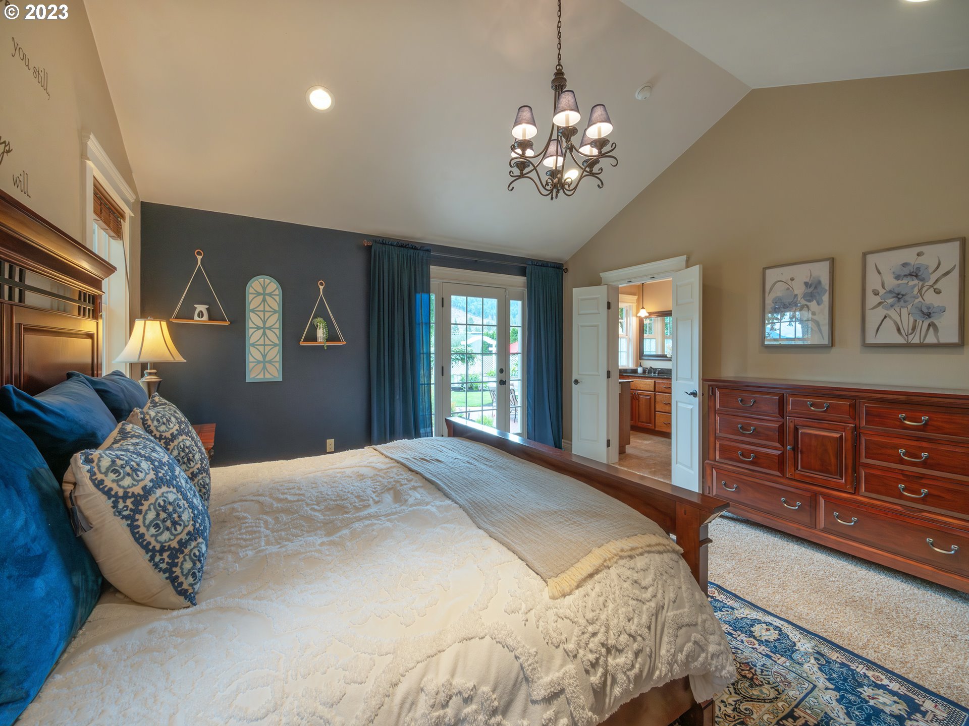 37692 Wheeler Road Dexter, OR 97431 - Photo 13 of 48 a spacious bedroom with a large bed and dresser