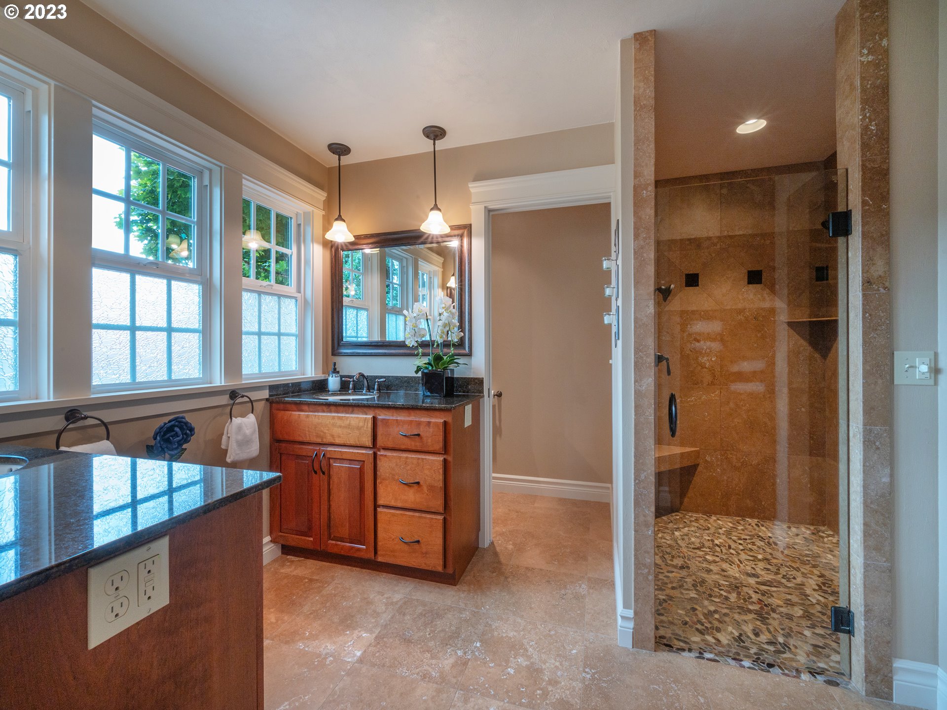 37692 Wheeler Road Dexter, OR 97431 - Photo 14 of 48 a bathroom with a tub shower and sink