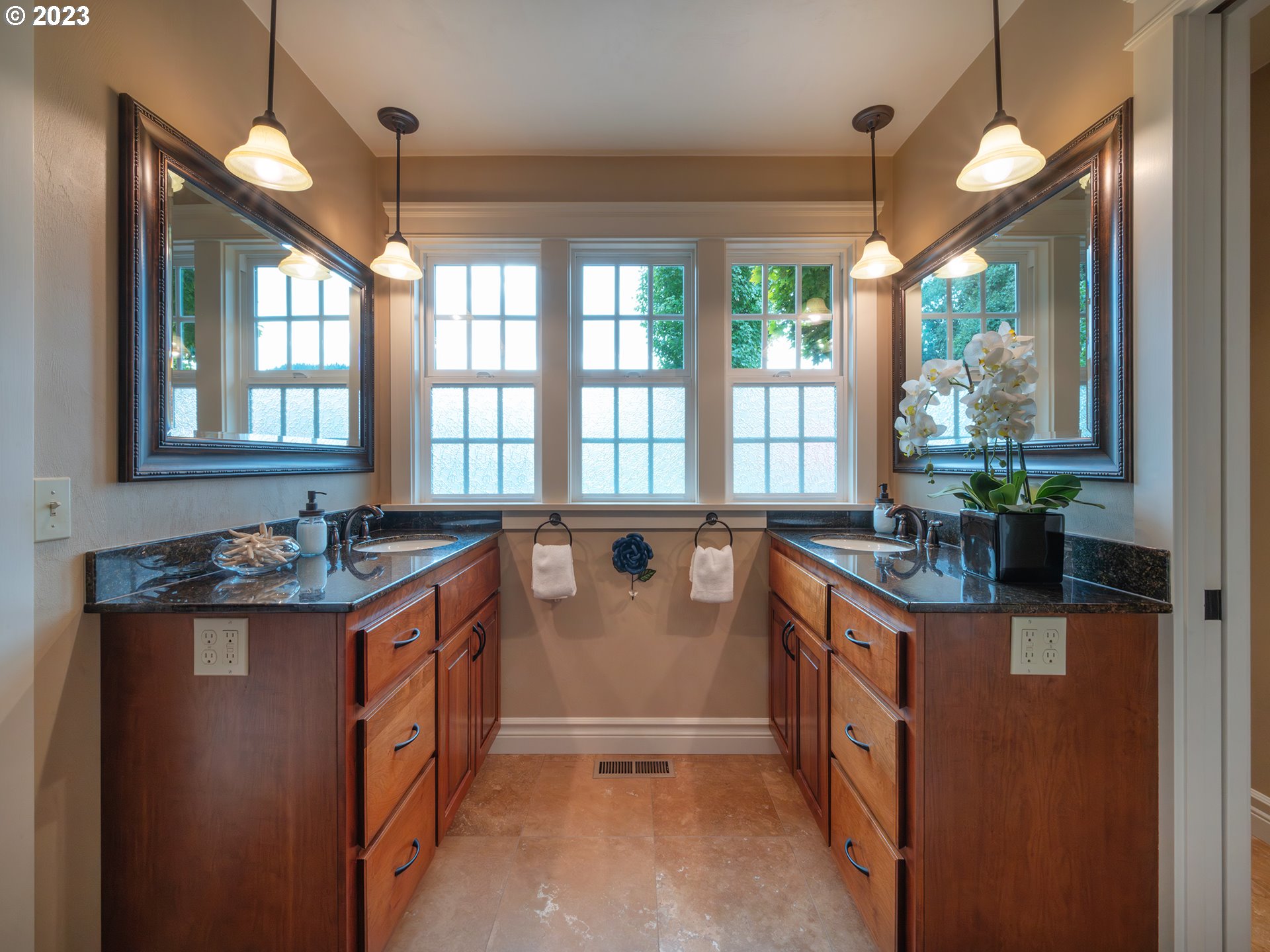 37692 Wheeler Road Dexter, OR 97431 - Photo 16 of 48 a kitchen with stainless steel appliances granite countertop a stove and a large window