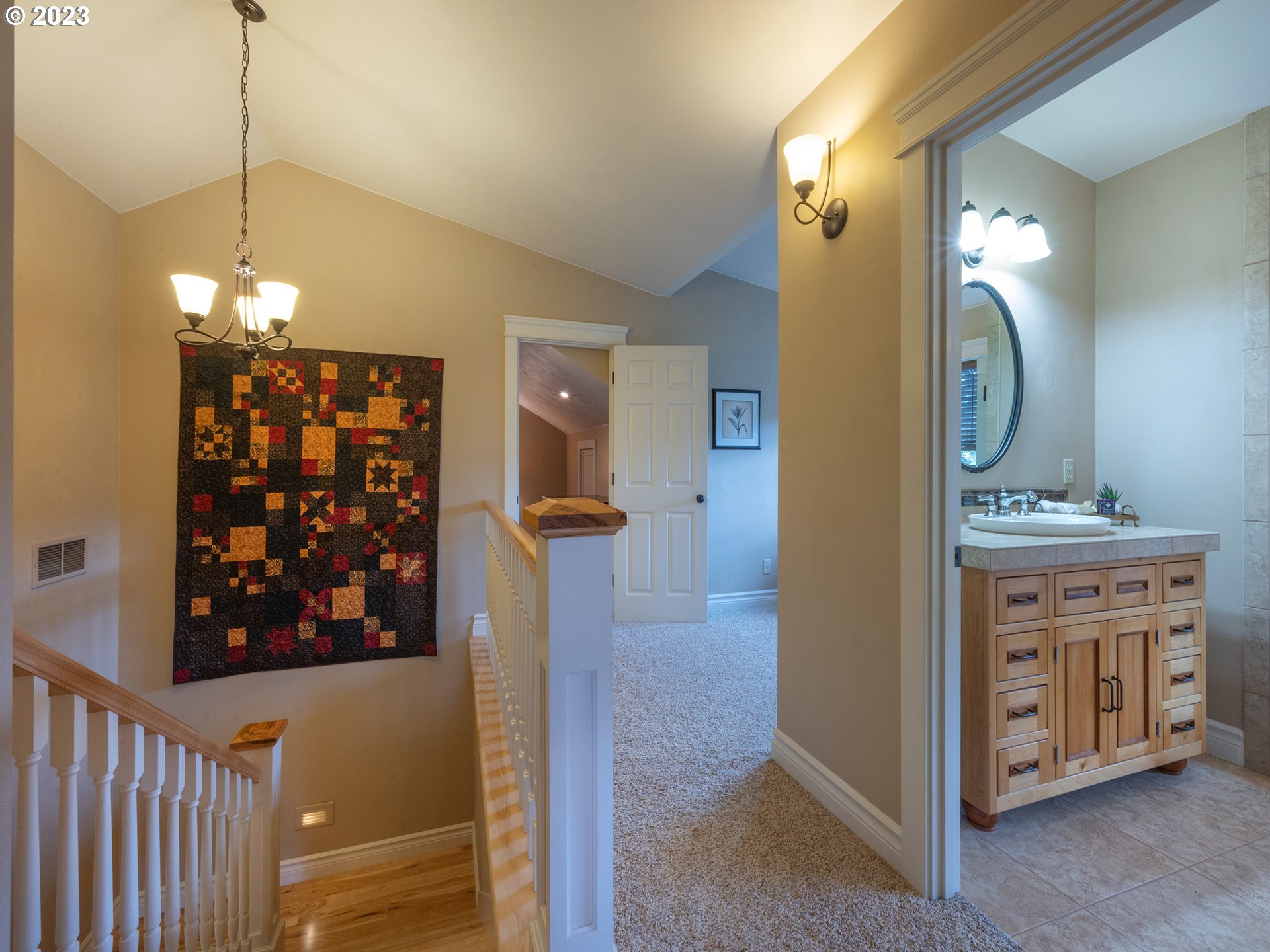 37692 Wheeler Road Dexter, OR 97431 - Photo 24 of 48 a view of a hallway with front door wooden floor and cabinet