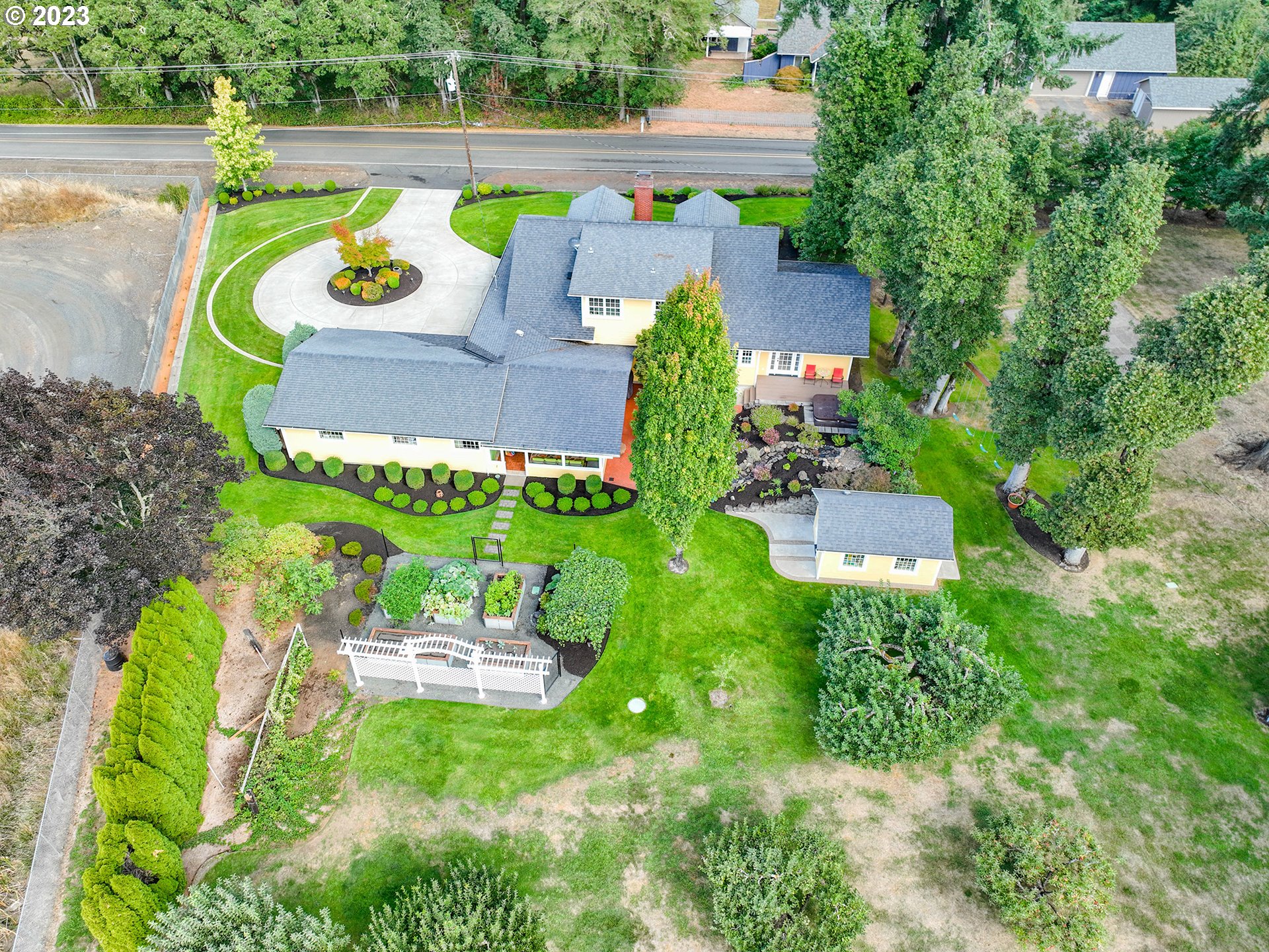 37692 Wheeler Road Dexter, OR 97431 - Photo 44 of 48 an aerial view of a house with a swimming pool patio and outdoor seating