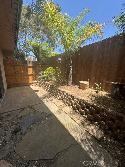 239 Surf Street, Unit D Morro Bay, CA 93442 - Photo 20 of 25 a view of a yard