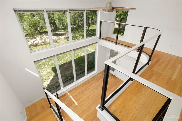 a view of an chairs in the balcony