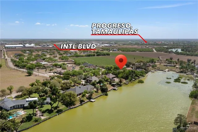 a large sign that is sitting in the middle of a field