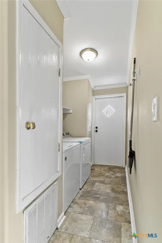 a bathroom with a sink and shower