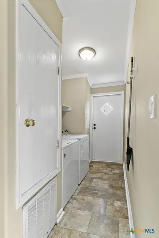 a bathroom with a sink and shower
