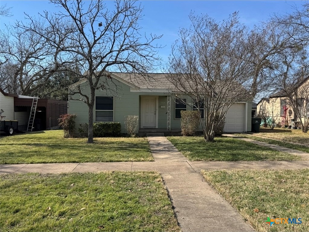 1506 South 9th Street Temple, TX 76504 - Photo 1 of 17 a view of a house with a yard
