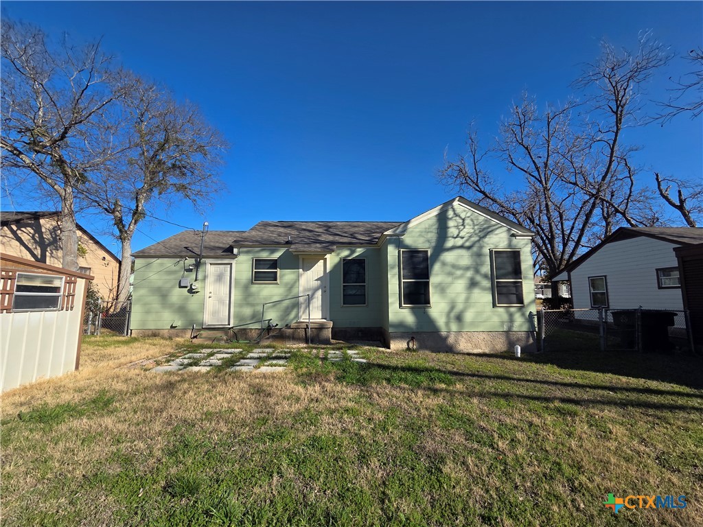 1506 South 9th Street Temple, TX 76504 - Photo 16 of 17 a front view of a house with a yard