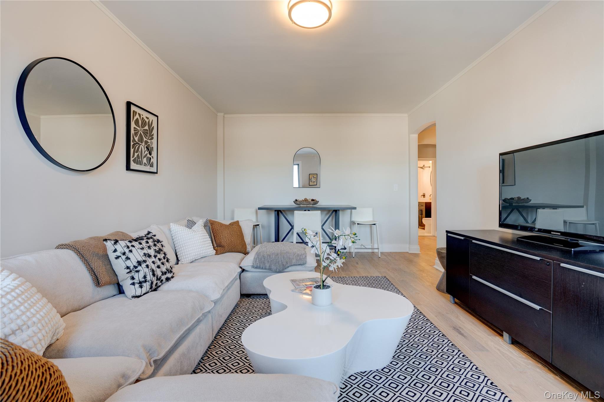 2226 76th Street, Unit C3 Queens, NY 11370 - Photo 2 of 20 a living room with furniture