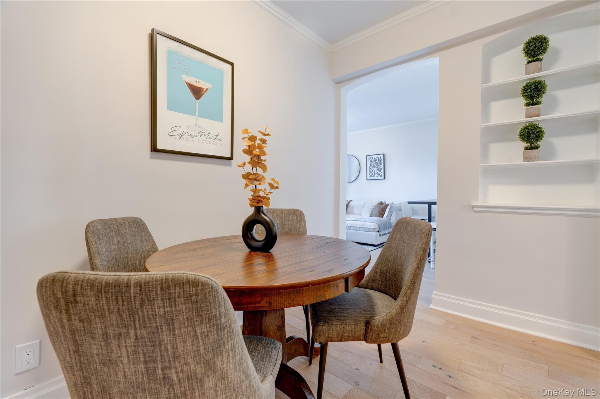 2226 76th Street, Unit C3 Queens, NY 11370 - Photo 7 of 20 a living room with furniture and wooden floor