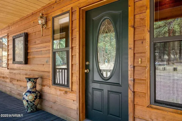 a view of a entryway door front of a house