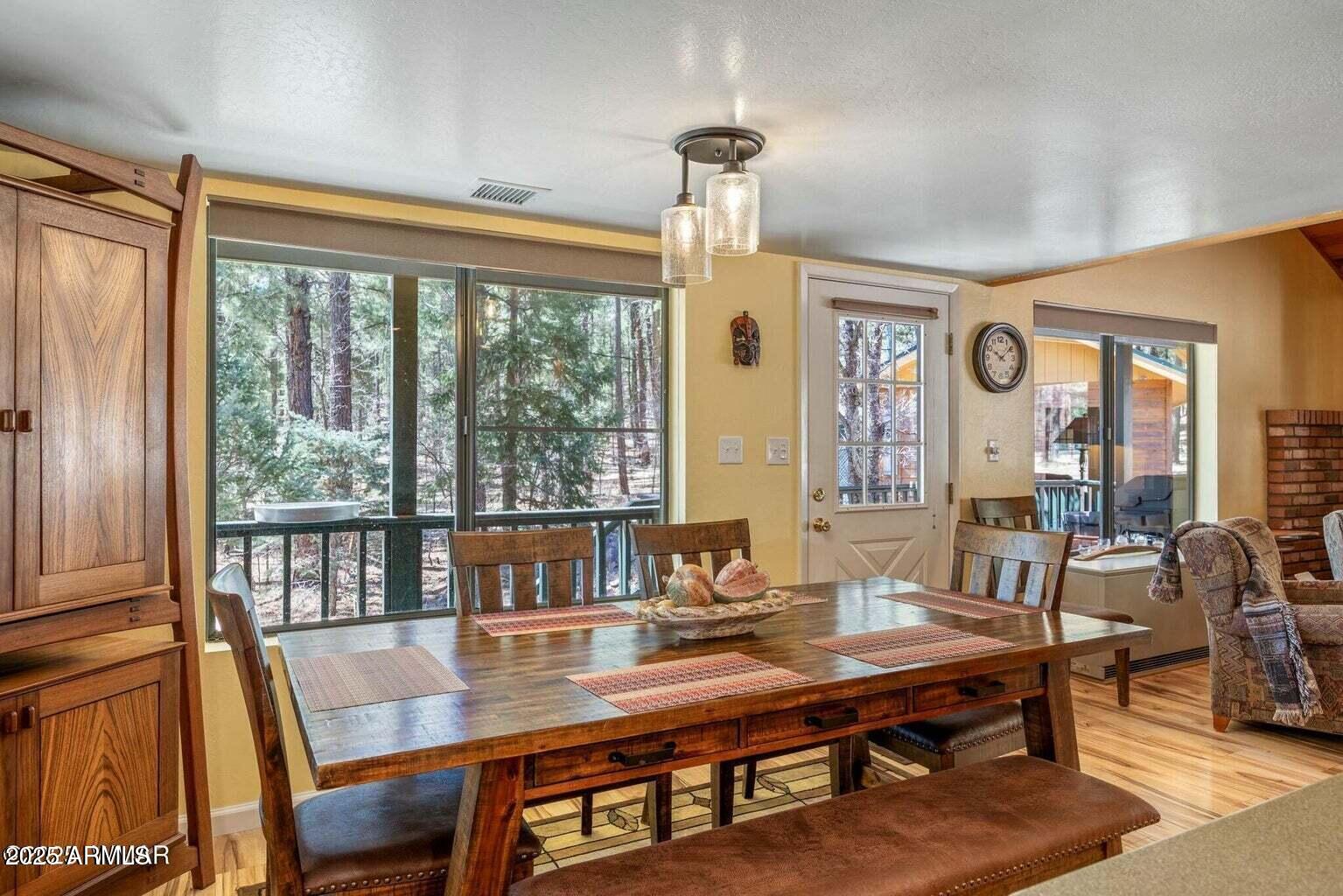 61 County Road 2266 Alpine, AZ 85920 - Photo 18 of 51 a view of a dining room with furniture window and outside view