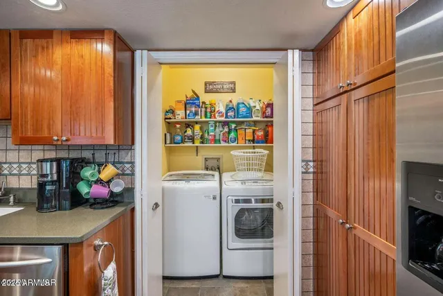 a utility room with dryer and washer