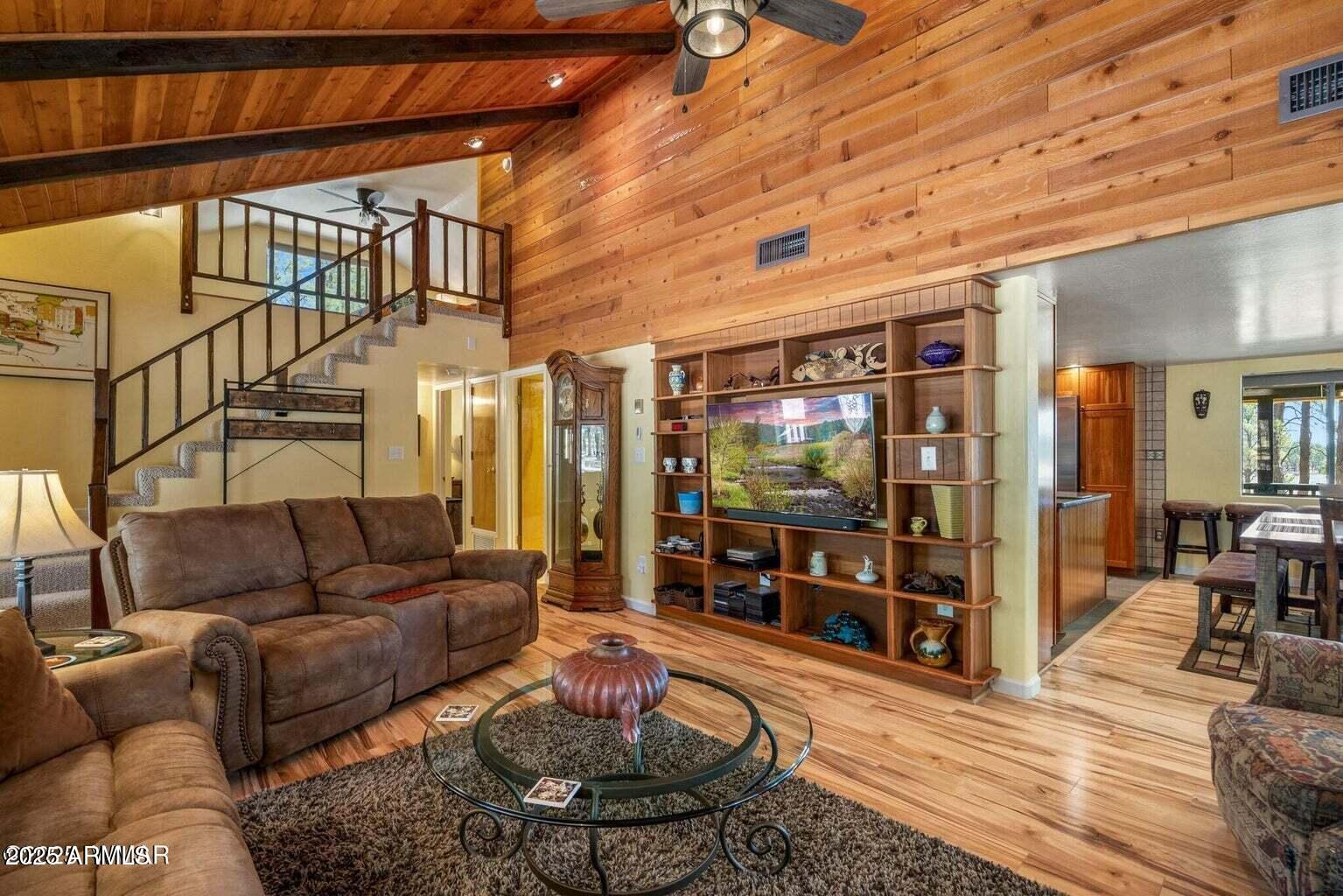 61 County Road 2266 Alpine, AZ 85920 - Photo 3 of 51 a living room with furniture and wooden floor
