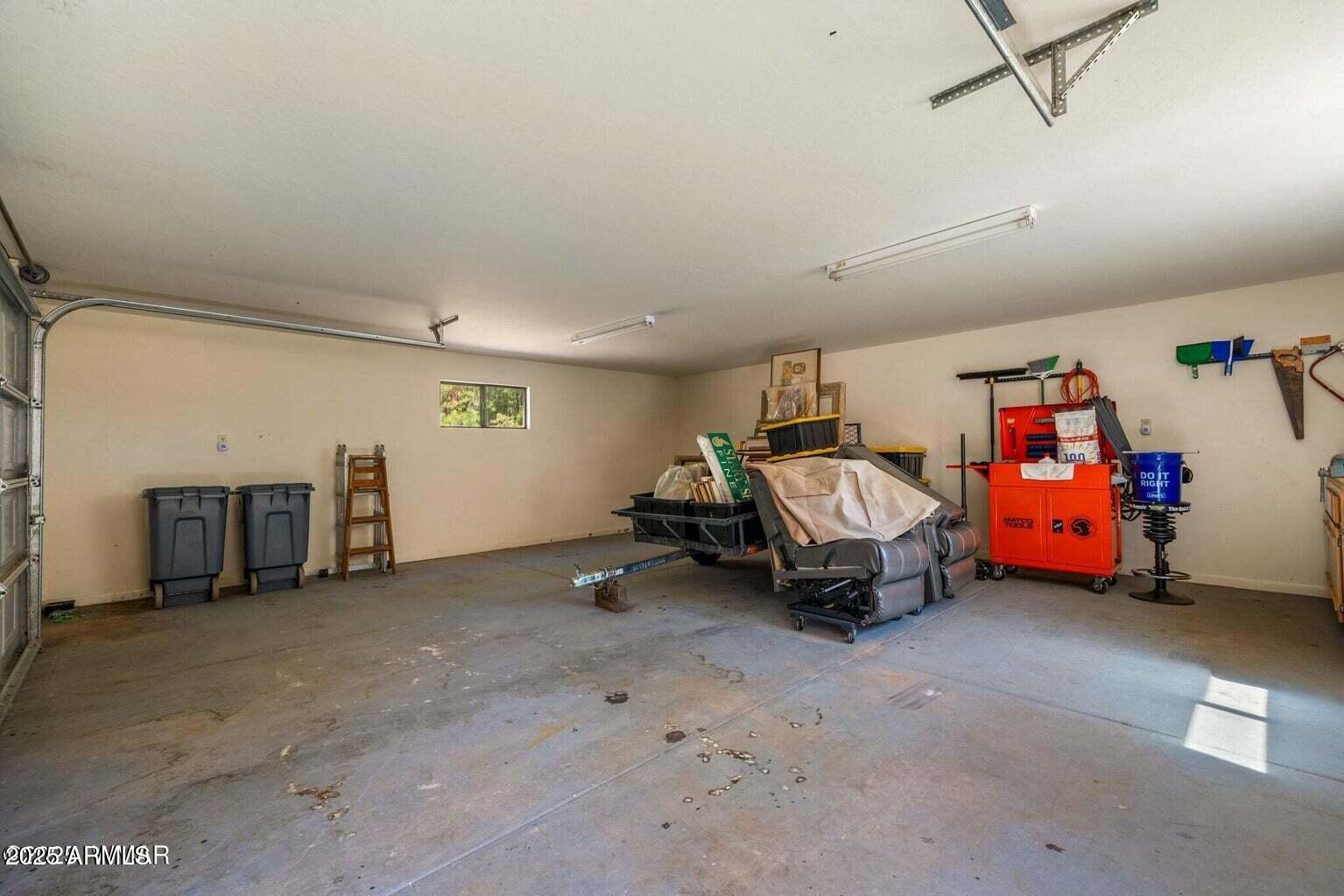 61 County Road 2266 Alpine, AZ 85920 - Photo 38 of 51 a car is parked in a garage