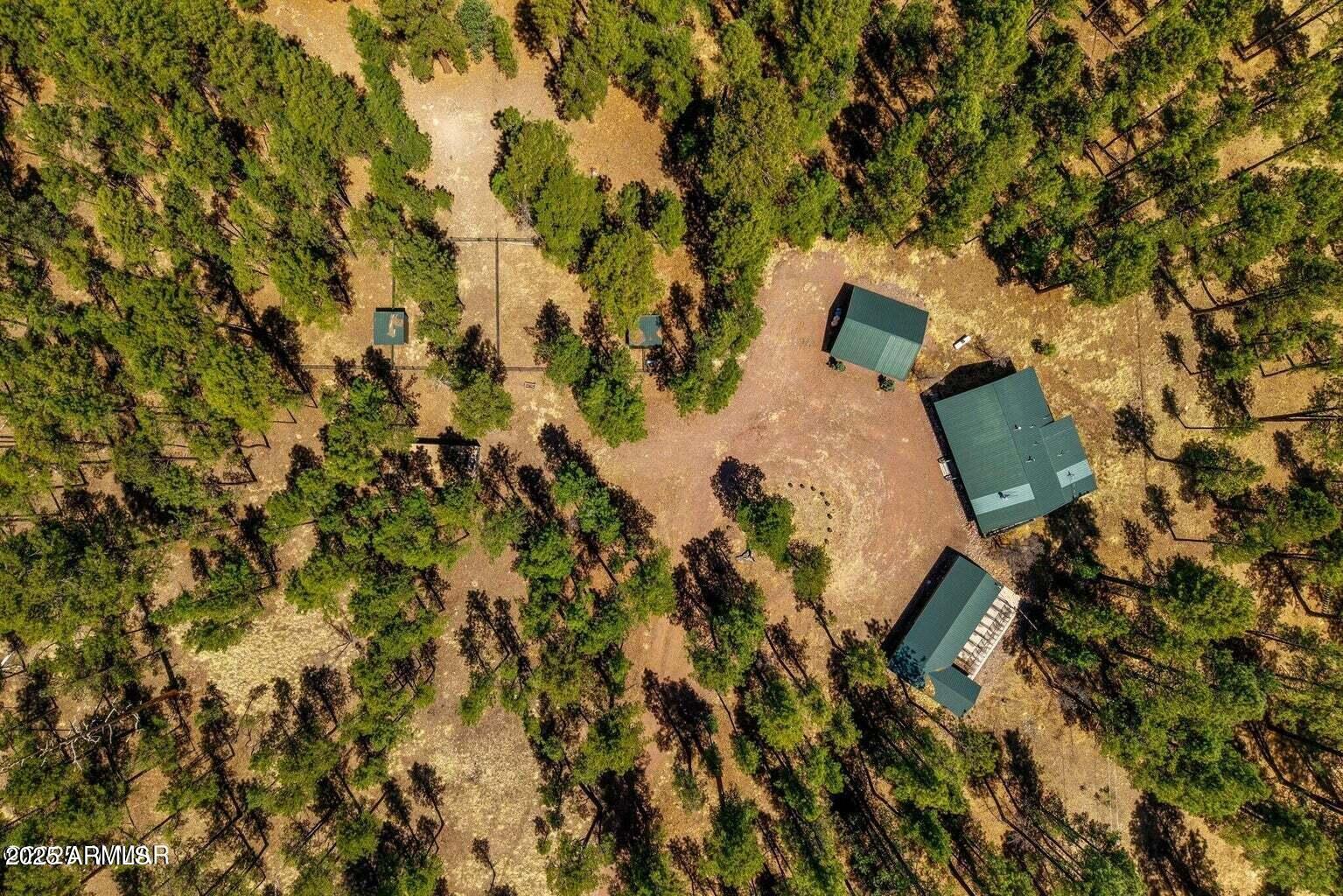 61 County Road 2266 Alpine, AZ 85920 - Photo 50 of 51 an aerial view of residential house with parking space