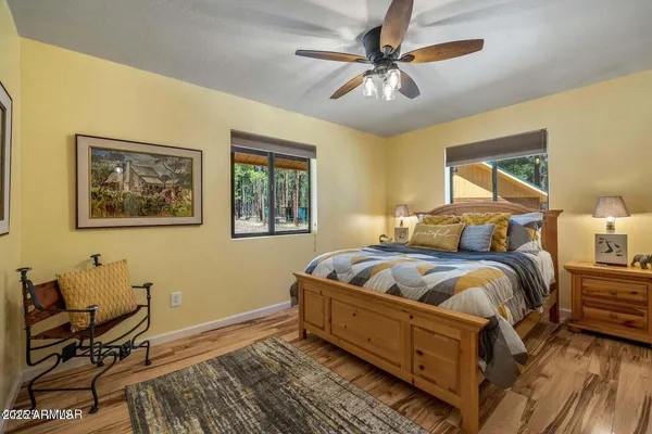 a bed room with bed and window